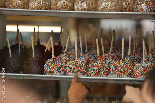 candy apples with sprinkles at the fair