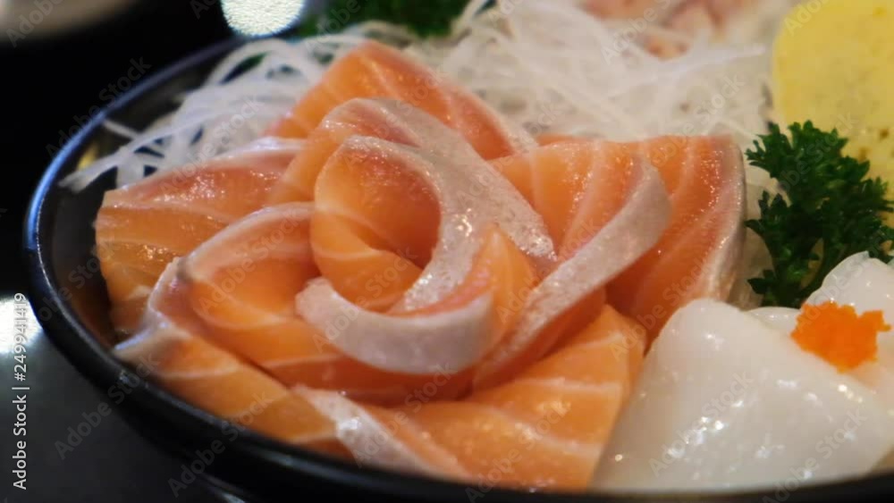 Sashimi set with salmon and ika squid and tamako egg. Japanese food. Sashimi set with salmon and ika squid and tamako egg. Japanese food.