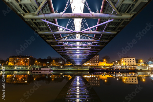 Bernatka footbridge over Vistula river at night, Krakow, Poland