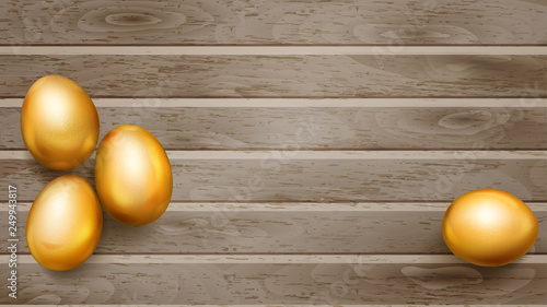 Realistic golden Easter eggs with shadows on wooden planks