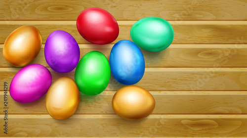 Realistic colored Easter eggs with shadows on wooden planks