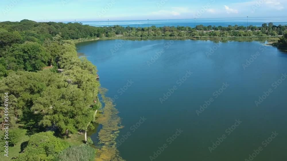 Aerial fly view of the lake at summer sunny hot day. Aerial fly view of the lake at summer sunny hot day.