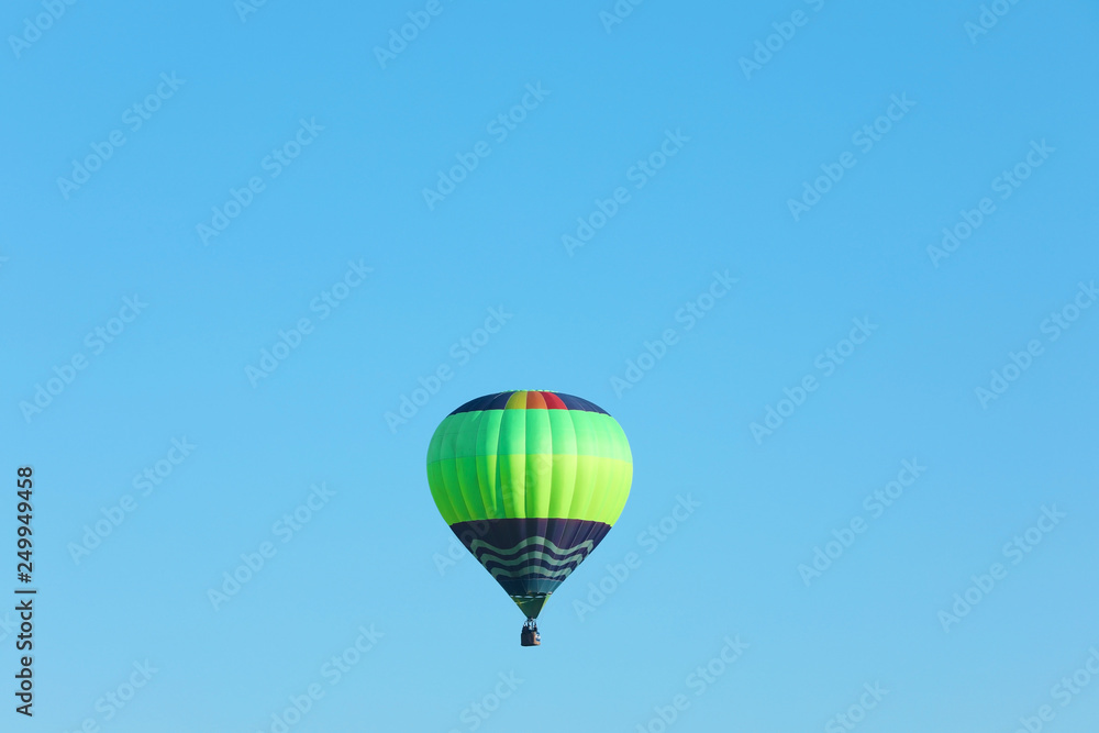 Obraz premium Beautiful view of hot air balloon in blue sky