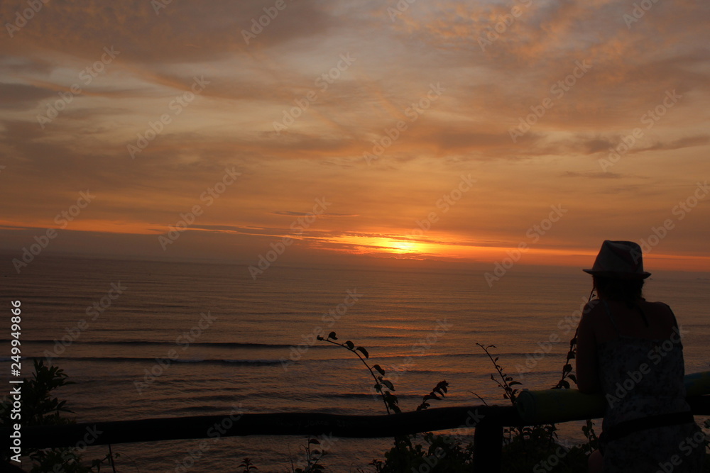 silhouette of a woman at sunset