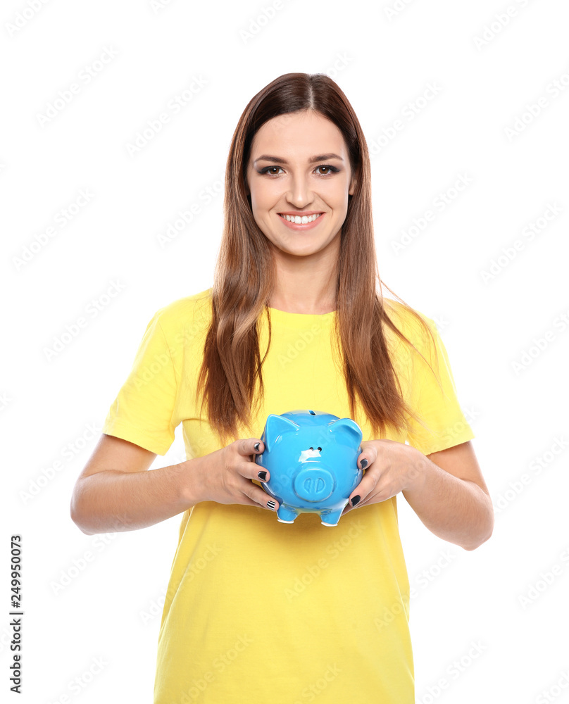 Young woman with piggy bank on white background Young woman with piggy bank on white background