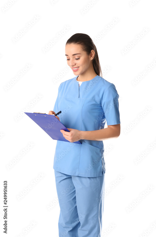 Young medical student with clipboard on white background