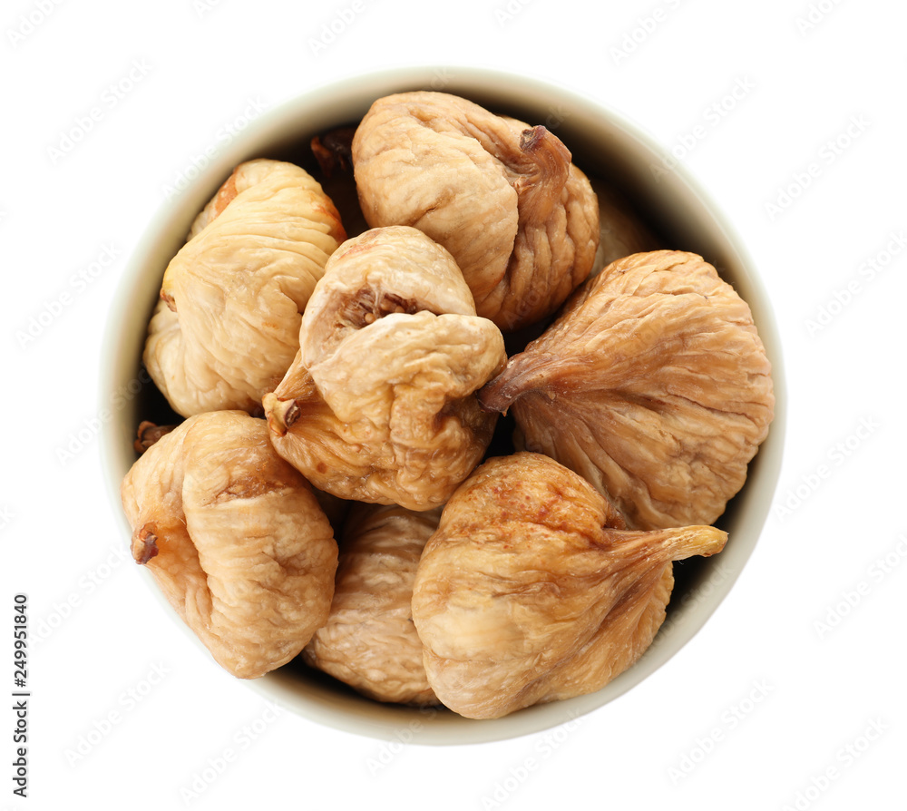 Bowl with figs on white background, top view. Dried fruit as healthy food Bowl with figs on white background, top view. Dried fruit as healthy food