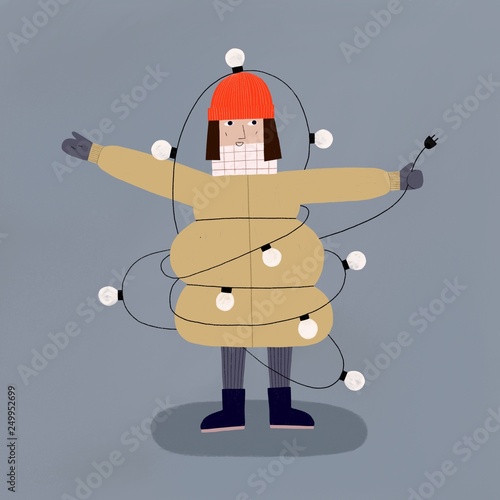 Winter lady with a big coat and a red hat wrapped in a light string