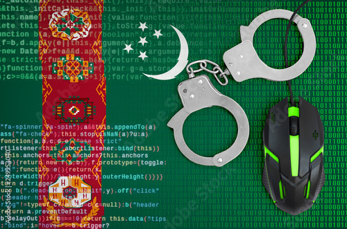 Turkmenistan flag  and handcuffed computer mouse. Combating computer crime, hackers and piracy photo