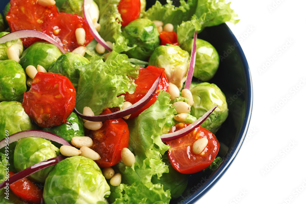 Bowl of salad with Brussels sprouts on white background, closeup Bowl of salad with Brussels sprouts on white background, closeup