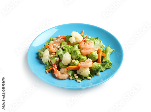 Plate of salad with Brussels sprouts isolated on white