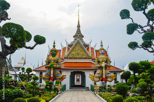 Wat Arun, Wat Arunrajawararam, Bangkok. Thai temple, gates with the gigantic guardians protecting it, Thailand, river temple