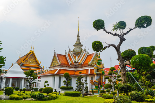 Wat Arun, Wat Arunrajawararam, Bangkok. Thai temple, gates with the gigantic guardians protecting it, Thailand, river temple