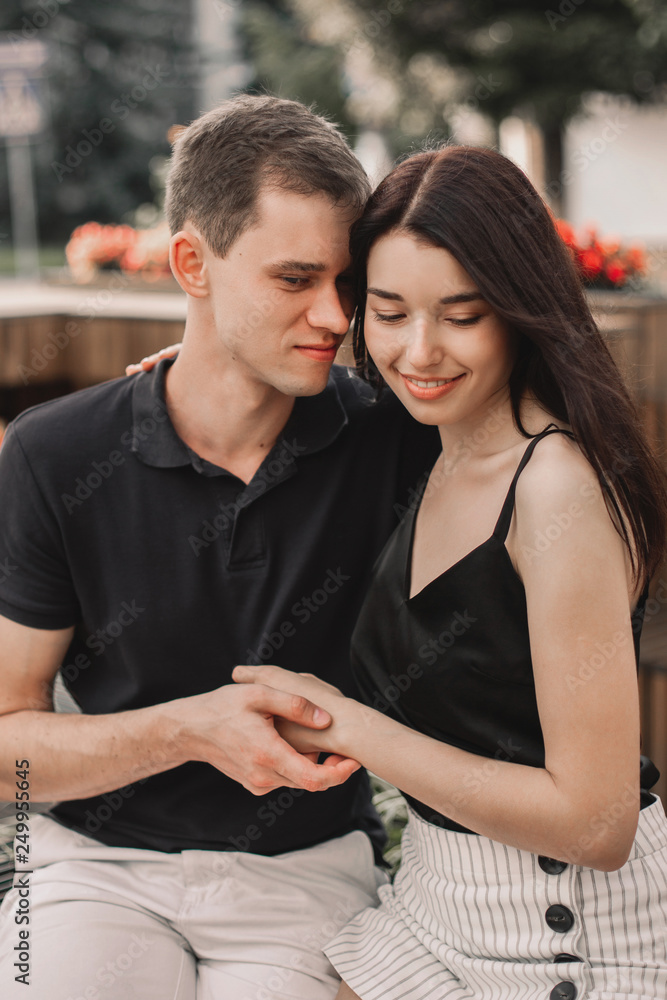 Loving couple hugging in the street. Loving couple hugging in the street.