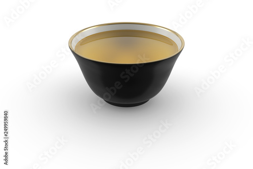 Black and white gold edging Japanese or Chinese tea bowl with green tea