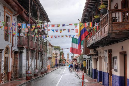 A view of a typical colonial style street in La Candelaria neighborhood, Bogota, Colombia. photo