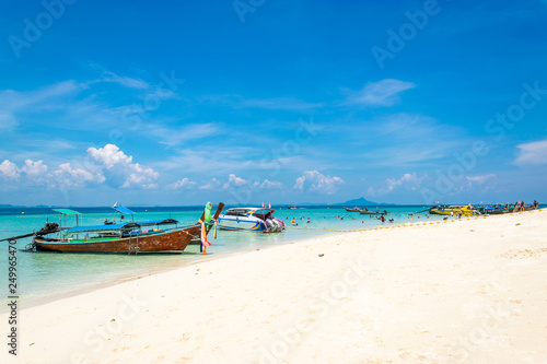A Thai long tail boat on the beach of Andaman sea located at Krabi near Phuket, Thailand