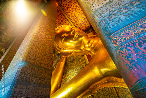 Reclinning golden buddha statue in pagoda of Wat Pho