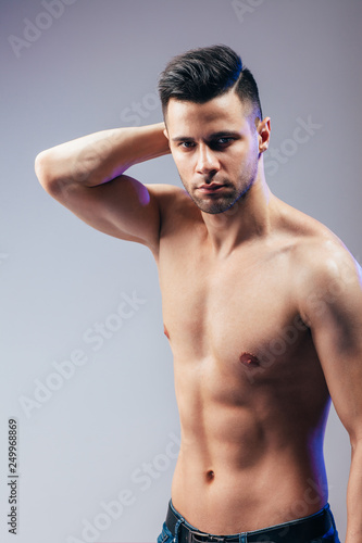 Portrait of a sexy muscular shirtless man posing