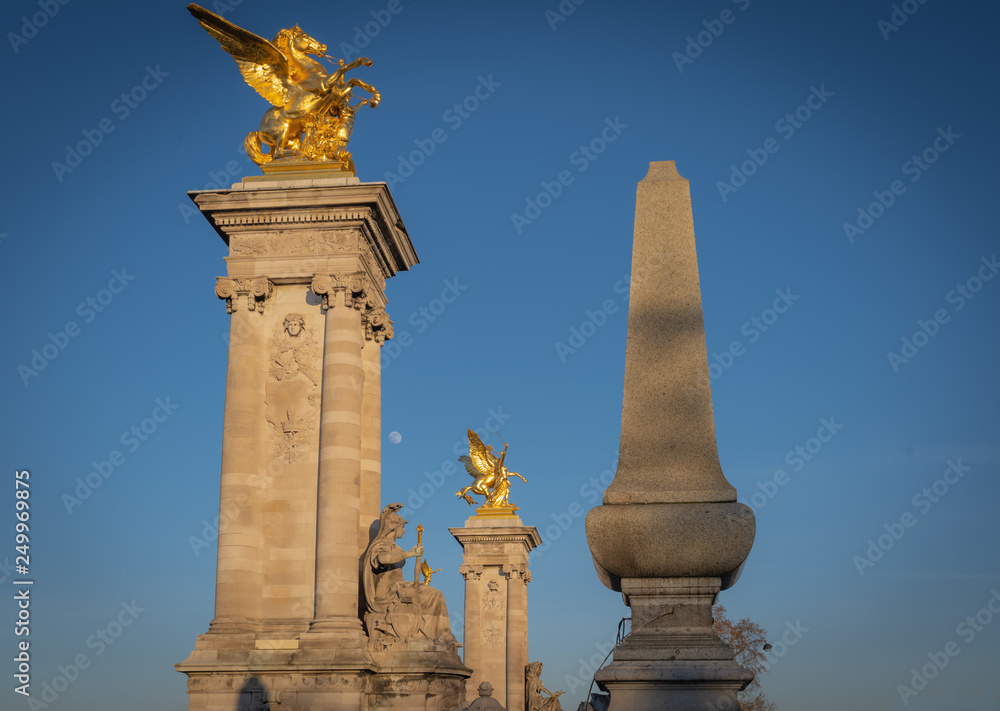 Paris, France - 02 17 2019: Details of the Alexander III bridge and the moon