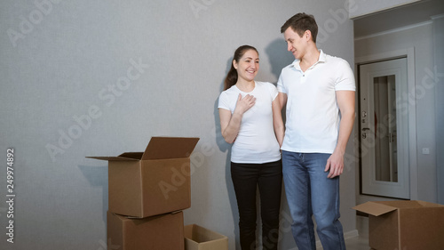 Young couple very happy and excited about moving into new apartment. © lenblr
