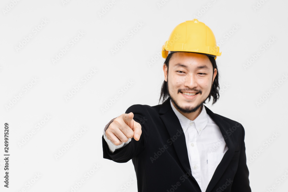 Portrait of Asian engineer point come forward.. Portrait of Asian engineer point come forward..