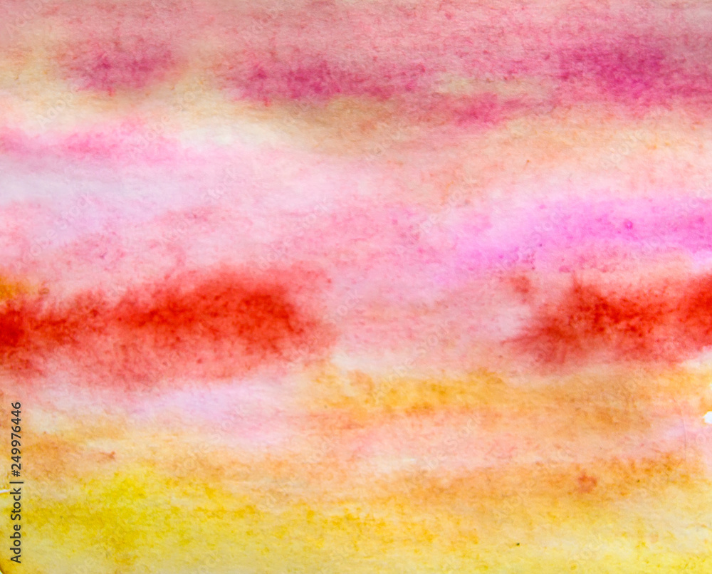 Hand draw watercolor texture splash on paper in red and yellow color