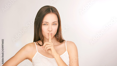 Beauty girl shh finger face. Silence secrect whisper. Bodylanguage tsss lady