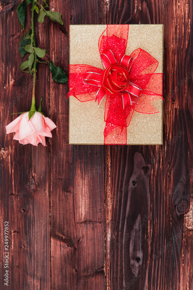 Valentine love heart card rose gift on wooden