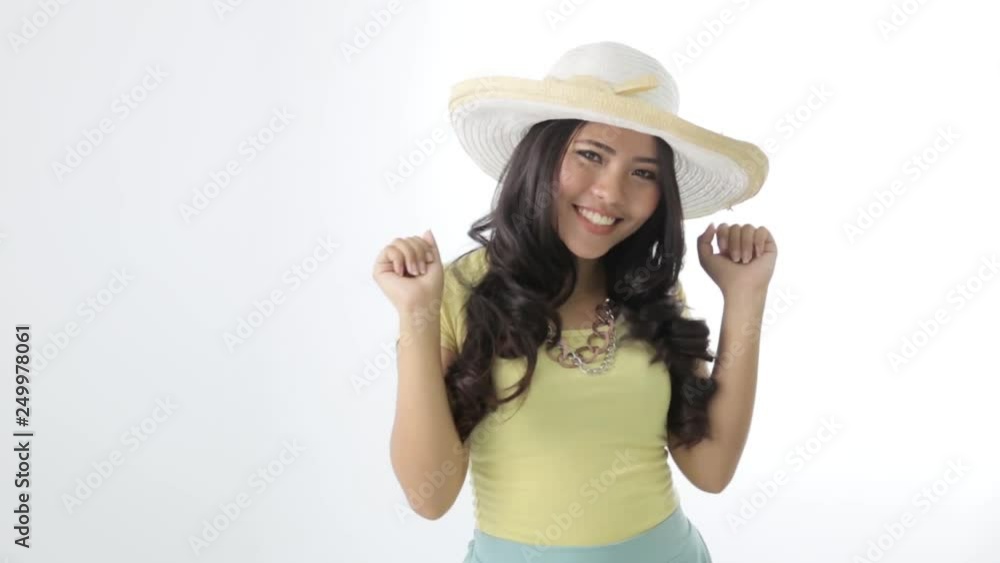 attractive asian happy young woman with hat dancing welcoming summer holiday attractive asian happy young woman with hat dancing welcoming summer holiday