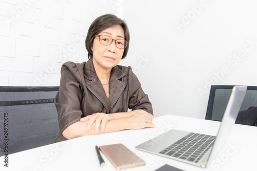 Asian woman working