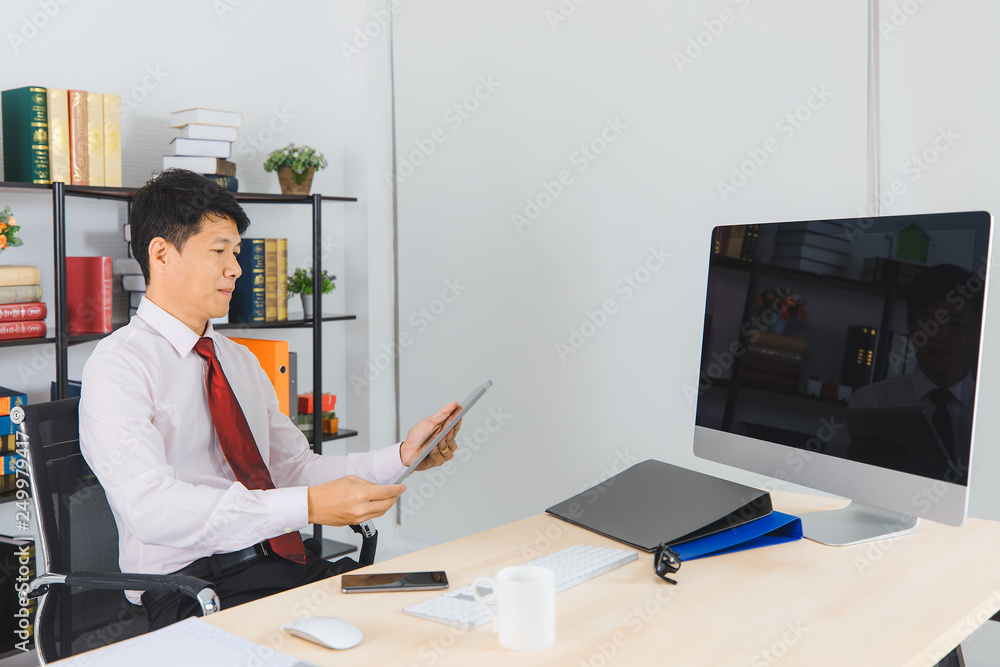 Asian business man at office Asian business man at office