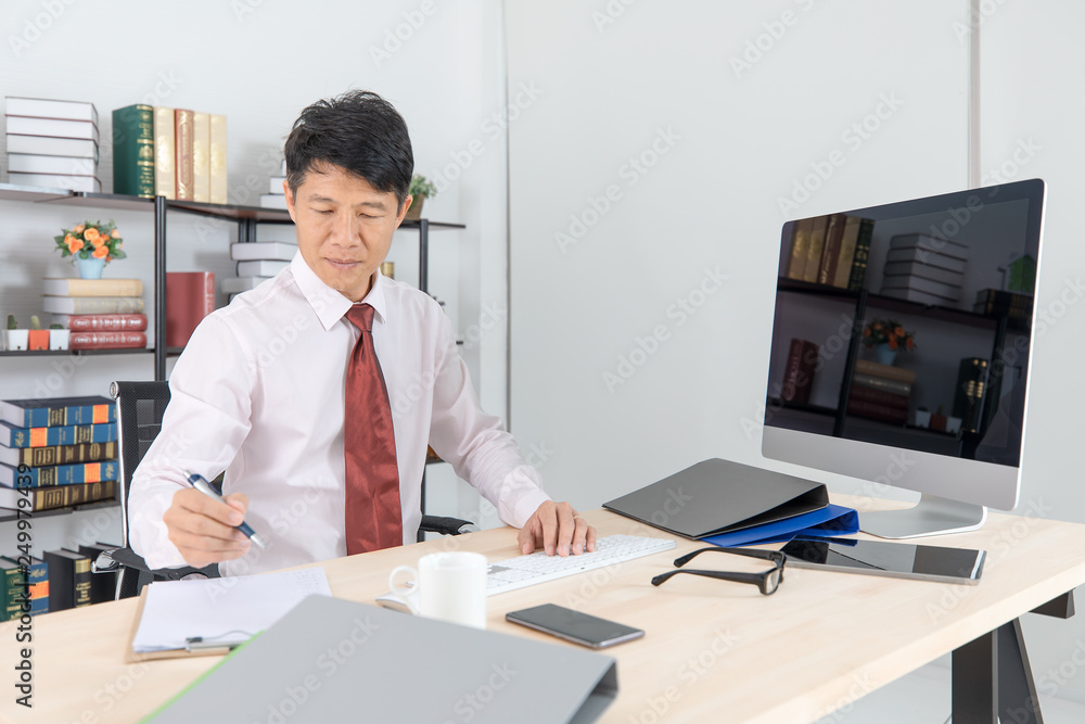 Asian business man at office Asian business man at office