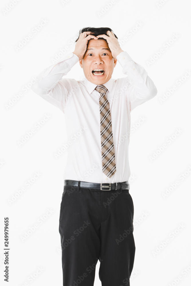 Half-length portrait of middle aged, handsome, Asian, businessman, in white shirt, striped tie.suffer from acute migraine, grimace, frown, painful from headache, on isolated white background Half-length portrait of middle aged, handsome, Asian, businessman, in white shirt, striped tie.suffer from acute migraine, grimace, frown, painful from headache, on isolated white background