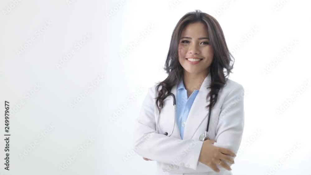 happy female doctor smiling to the camera over white background happy female doctor smiling to the camera over white background