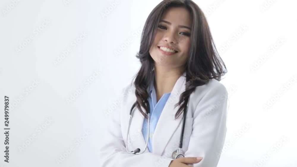 happy female doctor smiling to the camera over white background and showing thumb up happy female doctor smiling to the camera over white background and showing thumb up