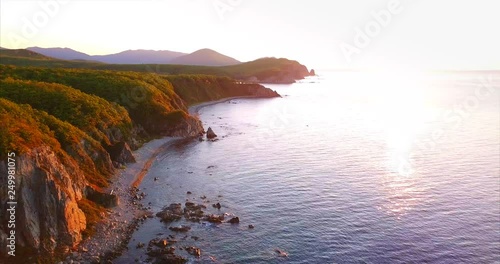 Amazing aerial view of the beautiful Russian Far East coastline and calm water in the early morning. It's an extreme east parts of Russia, between Lake Baikal in Eastern Siberia and Pacific Ocean