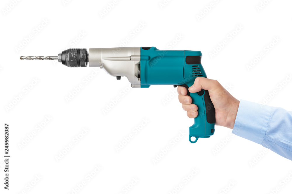 Electric drill in hand