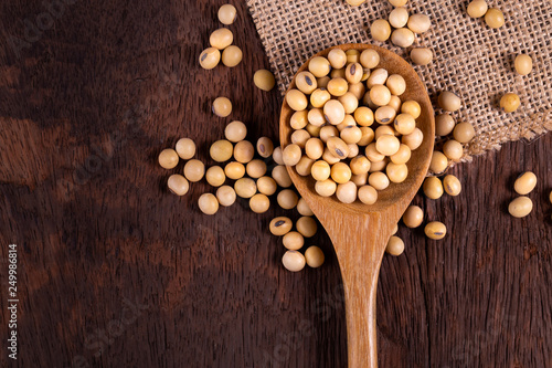 Soybean oil on a wooden background. rustic style