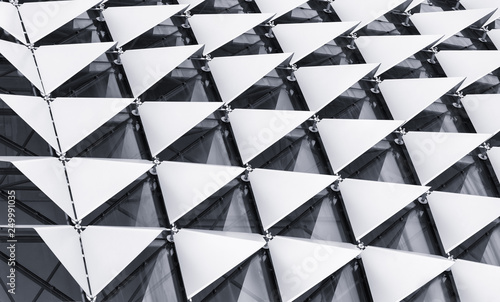 Photos Abstract close-up view of modern aluminum ventilated facade of triangles 3d illu