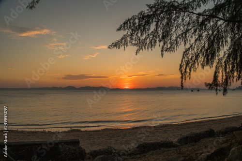 sunset at Kwang beach or deer beach there have a small island name Kwang island in the middle of Kwang beach in Krabi Thailand