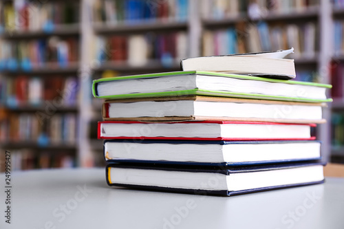 Stack of books on table in ...