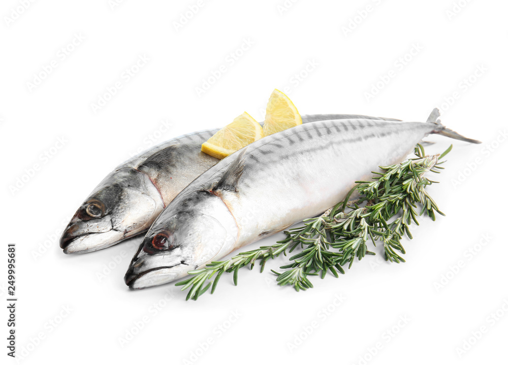 Tasty raw mackerel fish with rosemary and lemon on white background Tasty raw mackerel fish with rosemary and lemon on white background