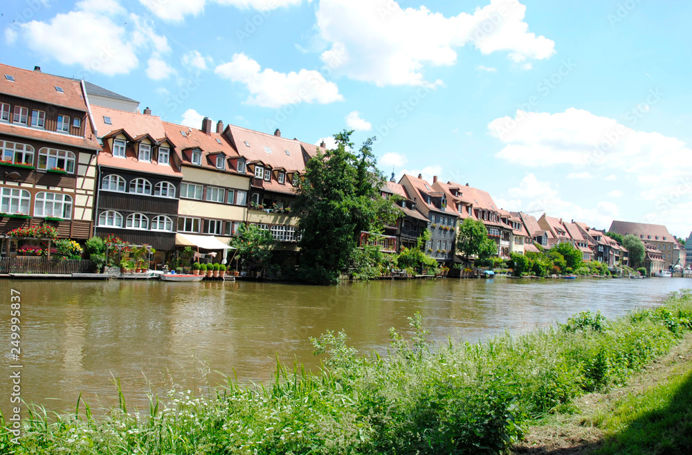 a row of Bavarian houses next to the river Regnitz in the Beautiful German city Bamberg