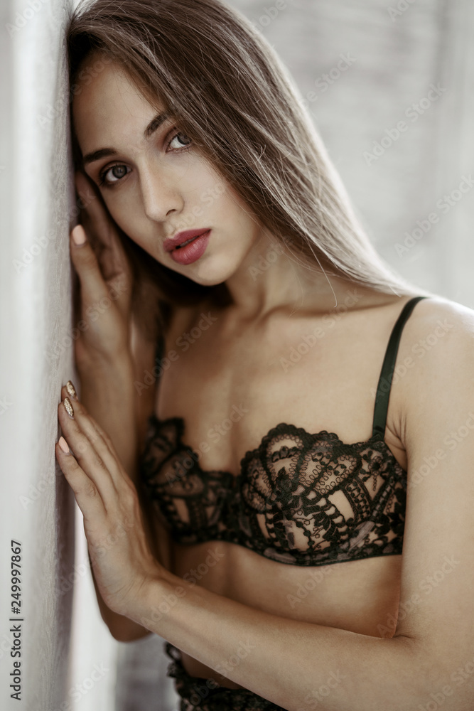 Fashionable female portrait of cute lady in green bra indoors