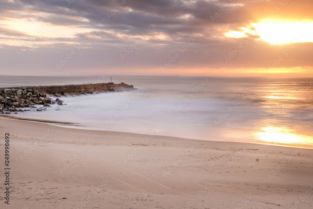 Stunning view of the sunset by the beach