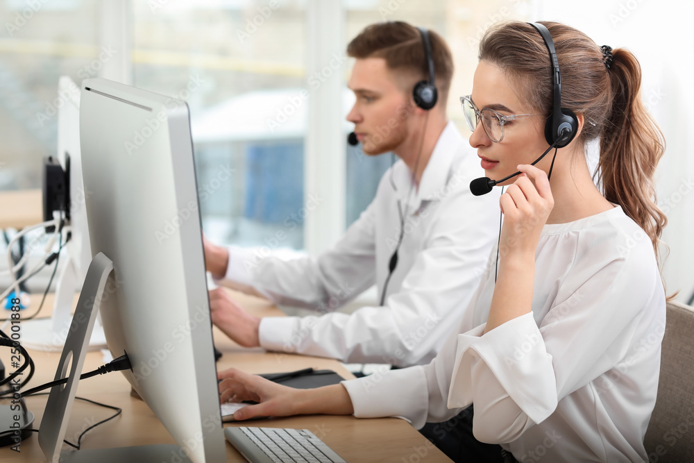 Technical support agents working in office Technical support agents working in office