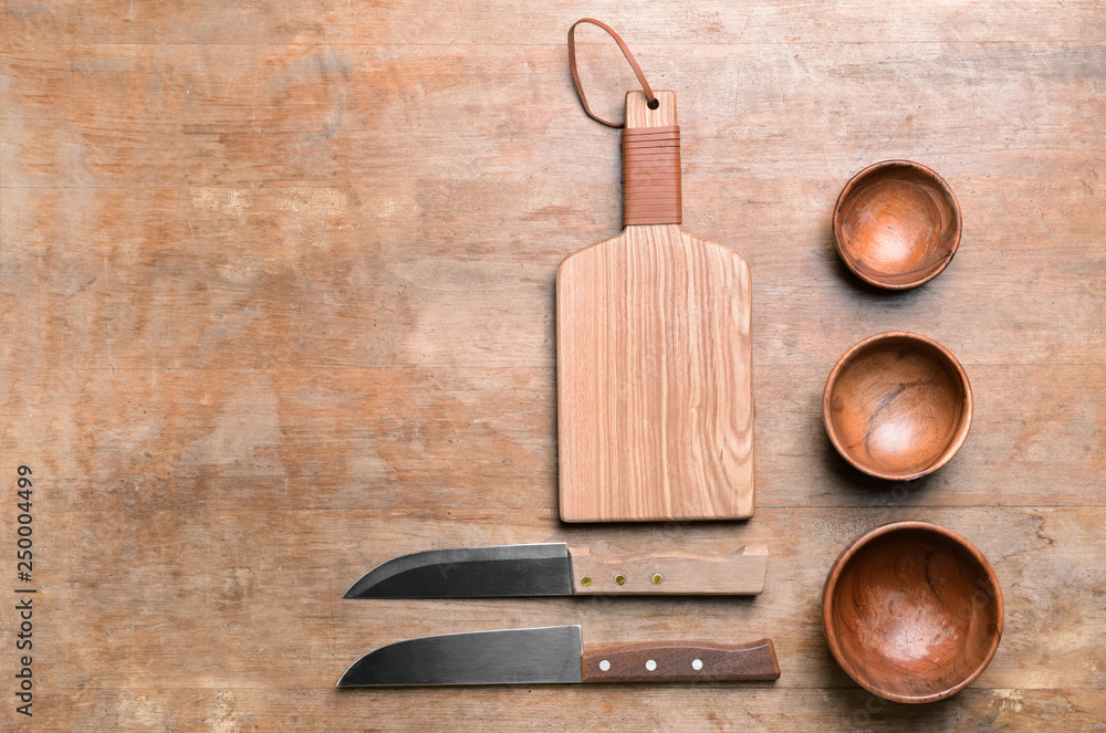 Set of kitchen utensils on wooden table