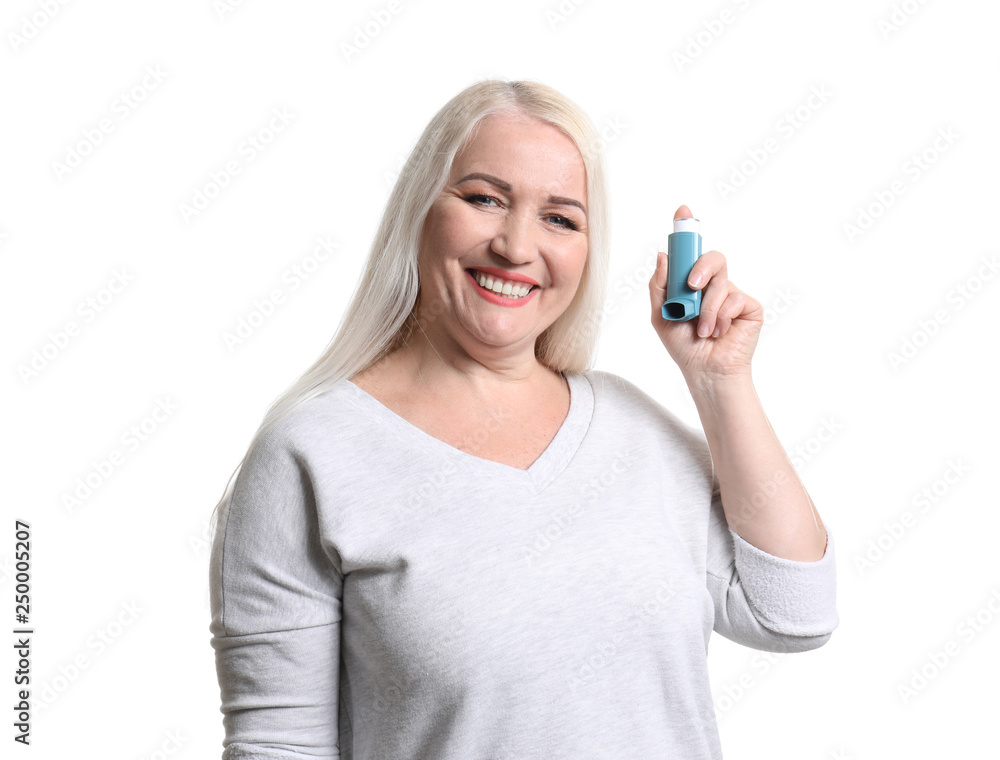 Mature woman with inhaler on white background Mature woman with inhaler on white background