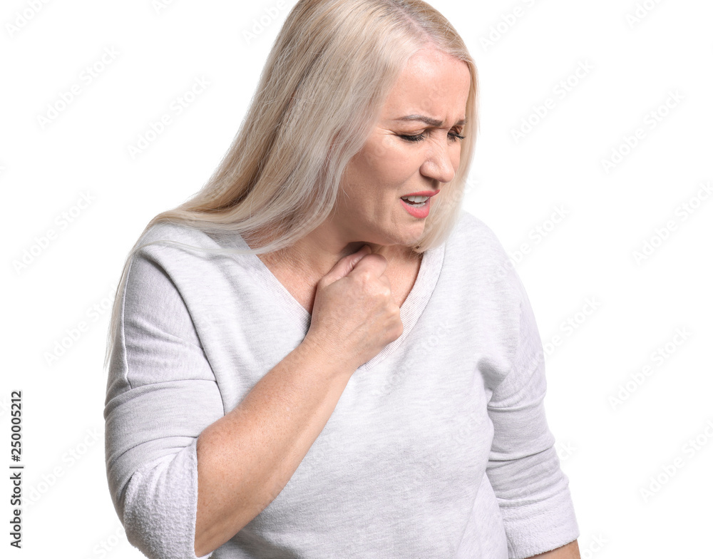 Mature woman having asthma attack on white background Mature woman having asthma attack on white background